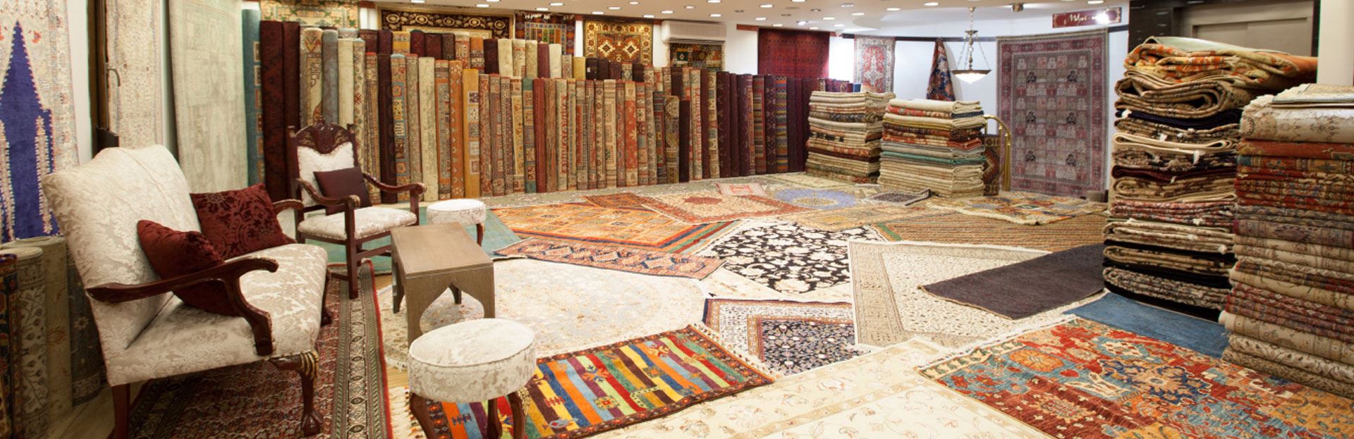 Inside Gallery Ottoman Art’s carpet and kilim showroom in Kuşadası